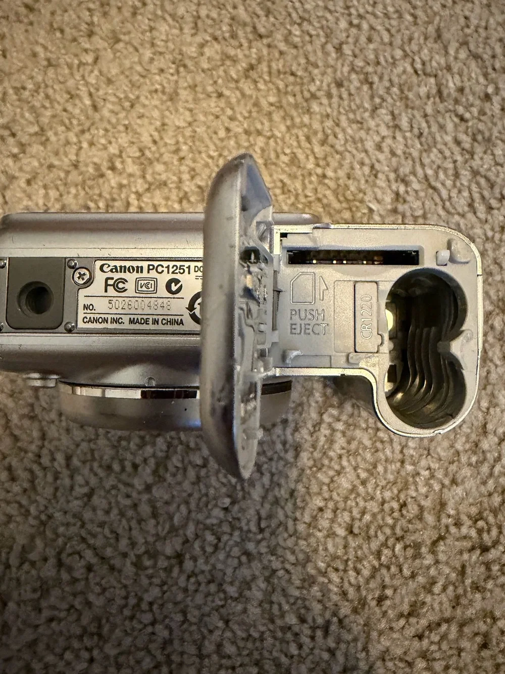 Canon PowerShot A720, battery door doesn’t stay shut